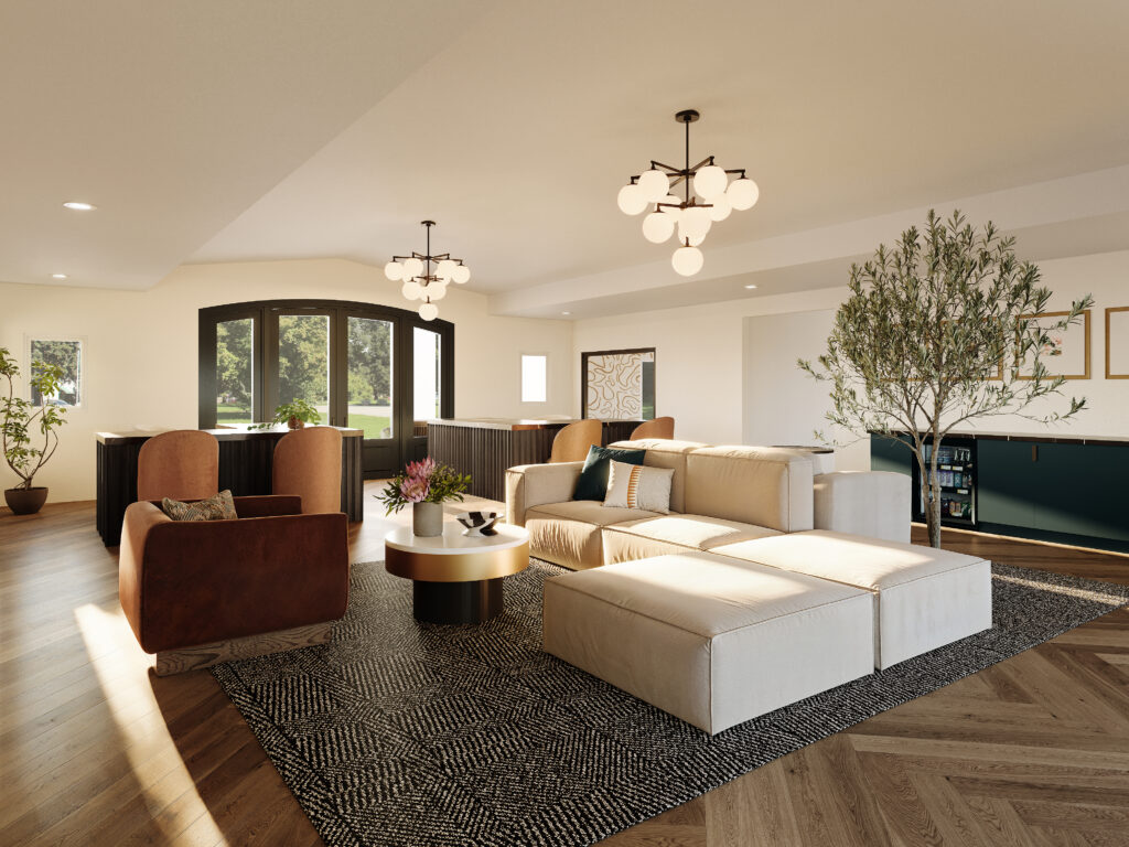 A modern, open-concept living room with a large sectional sofa, a round coffee table with flowers, and an olive tree. Sunlight streams in through large windows.